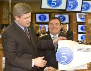 Stephen Harper cutting the GST to 5% with the late Jim Flaherty